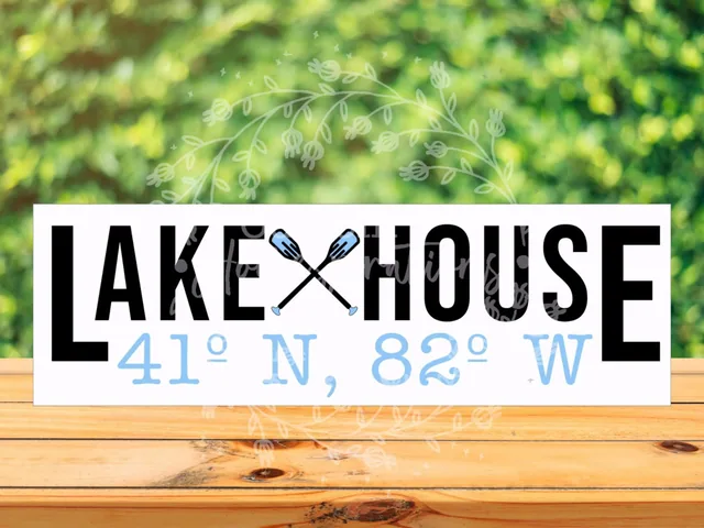 A white lake house sign with crossed paddles and coordinates.