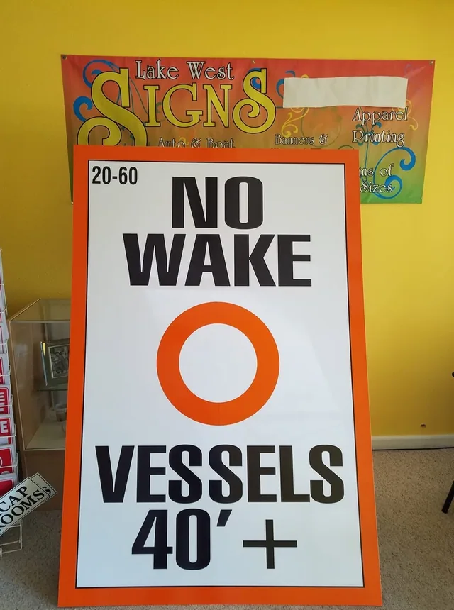 A no wake sign with an orange ring, in the shop.