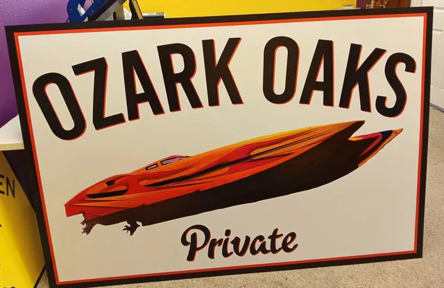 A private sign with a speedboat graphic and red lettering.